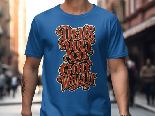 Blue t-shirt with "Deus Vult Co. God Wills It" text graphic.