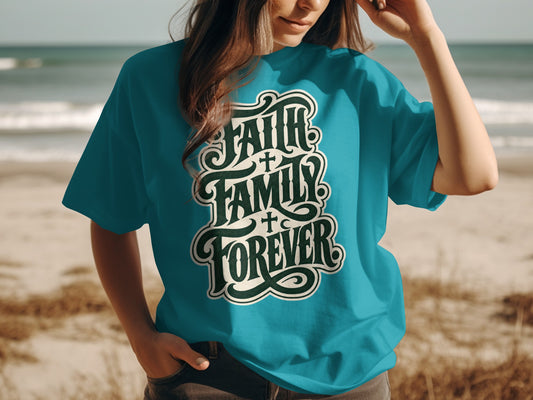 Teal t-shirt with "Faith, Family, Forever" graphic on beach background