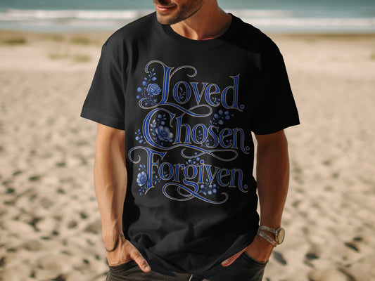 Black t-shirt with "Loved. Chosen. Forgiven." in ornate blue script and floral accents.