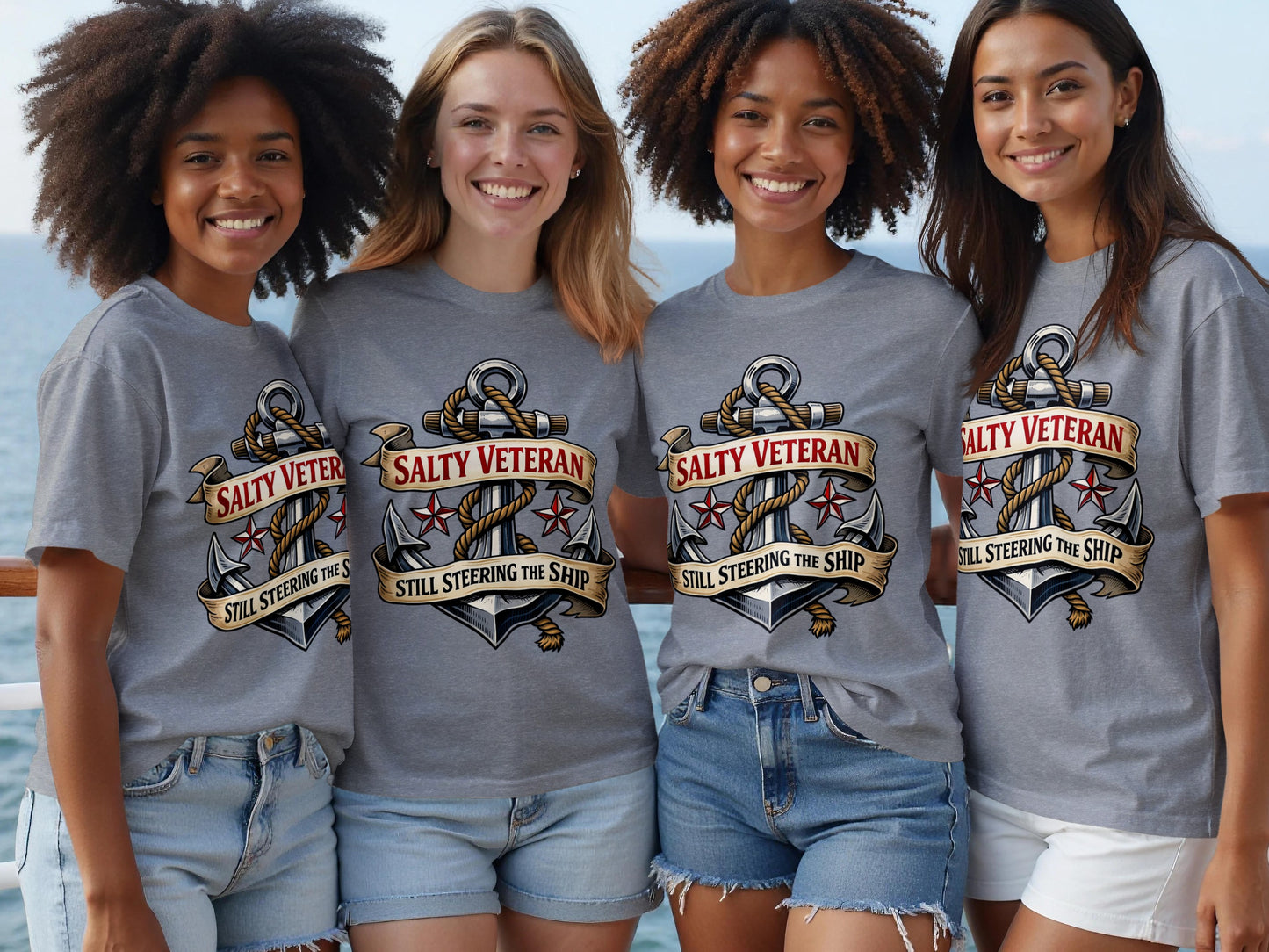 Four smiling women wear grey t-shirts with anchor and ribbon graphic and text.