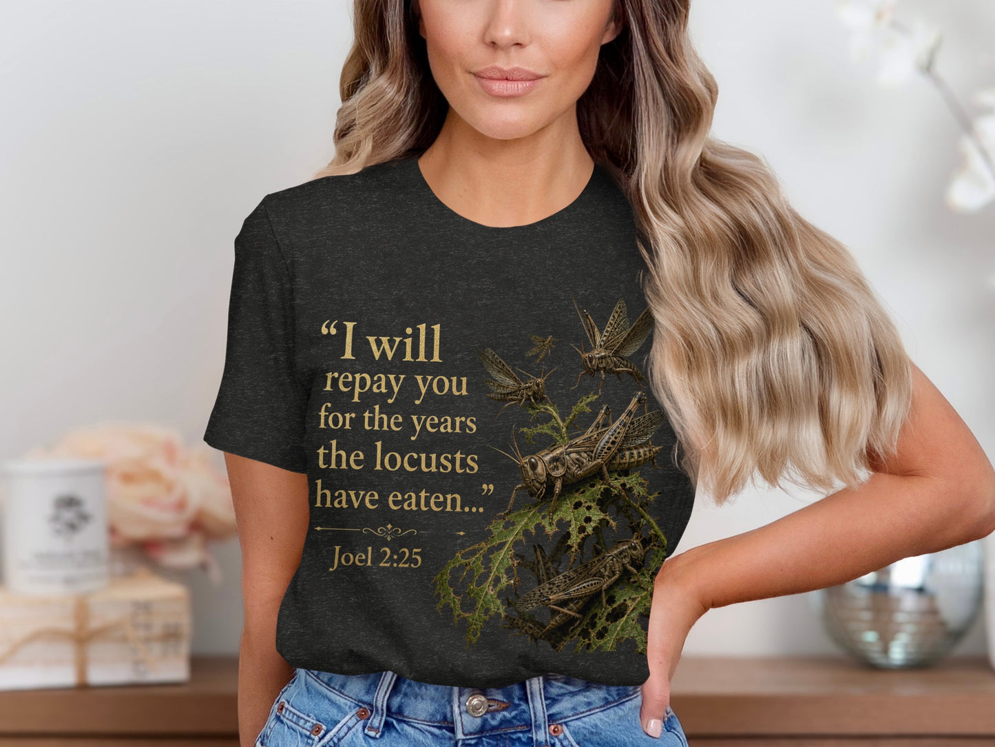 Dark t-shirt with "I will repay you for the years the locusts have eaten... Joel 2:25" and locusts.