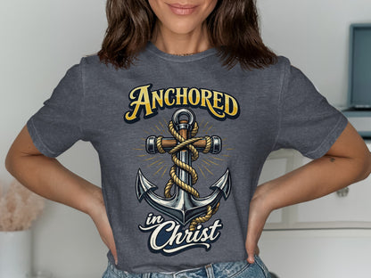 Anchor design with text "ANCHORED in Christ" on a grey t-shirt.