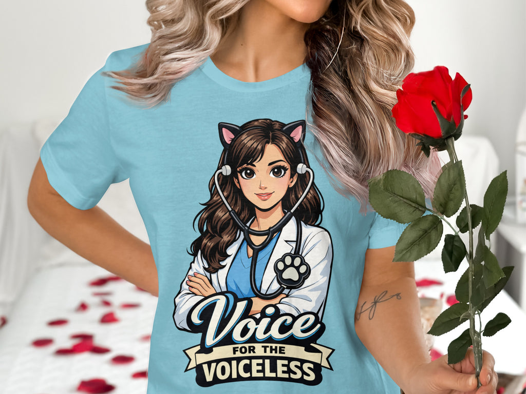 Light blue t-shirt with cartoon vet wearing cat ears and stethoscope. Text reads "Voice for the Voiceless".