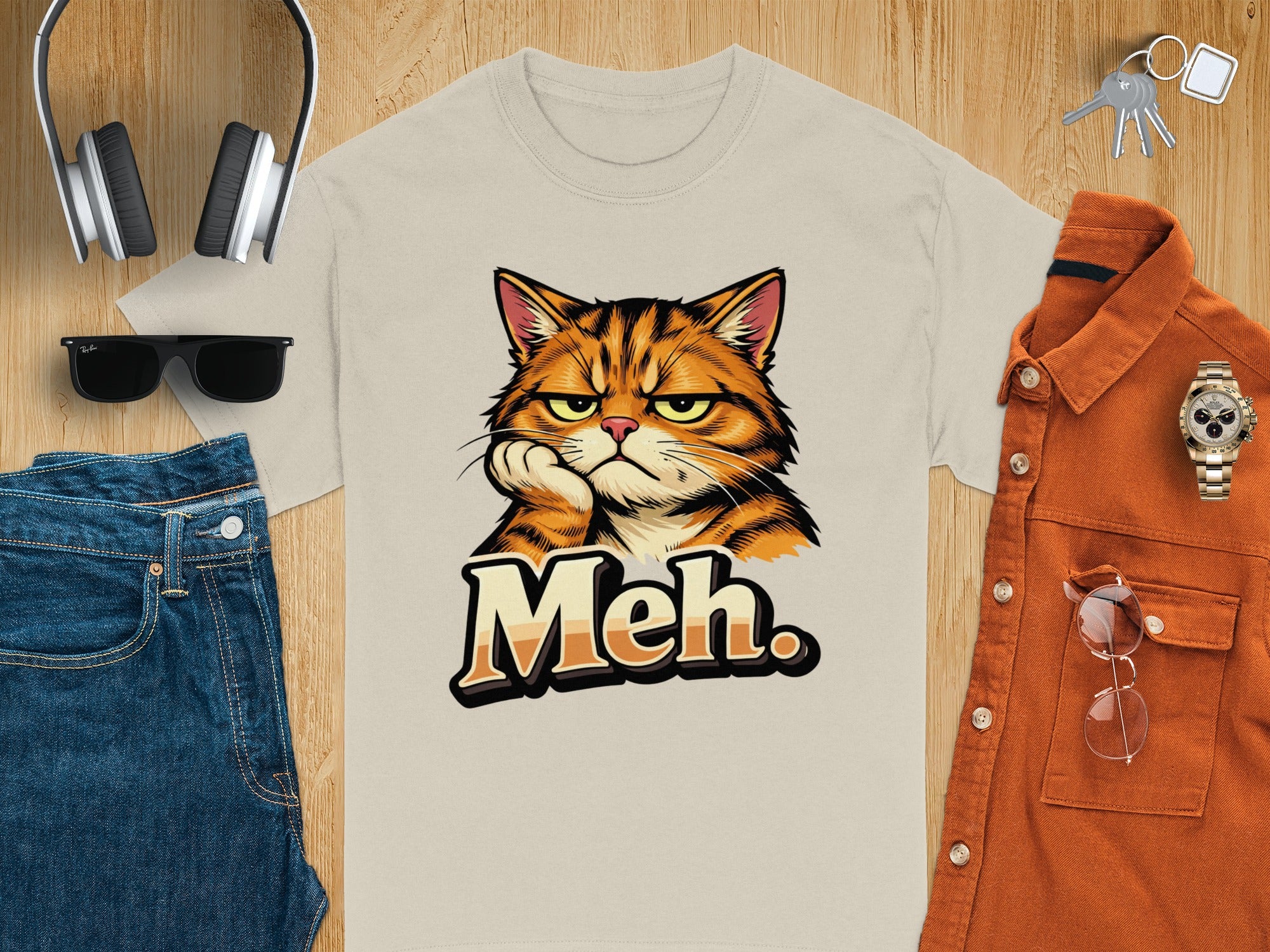 Beige t-shirt with grumpy cat graphic and "Meh." text.