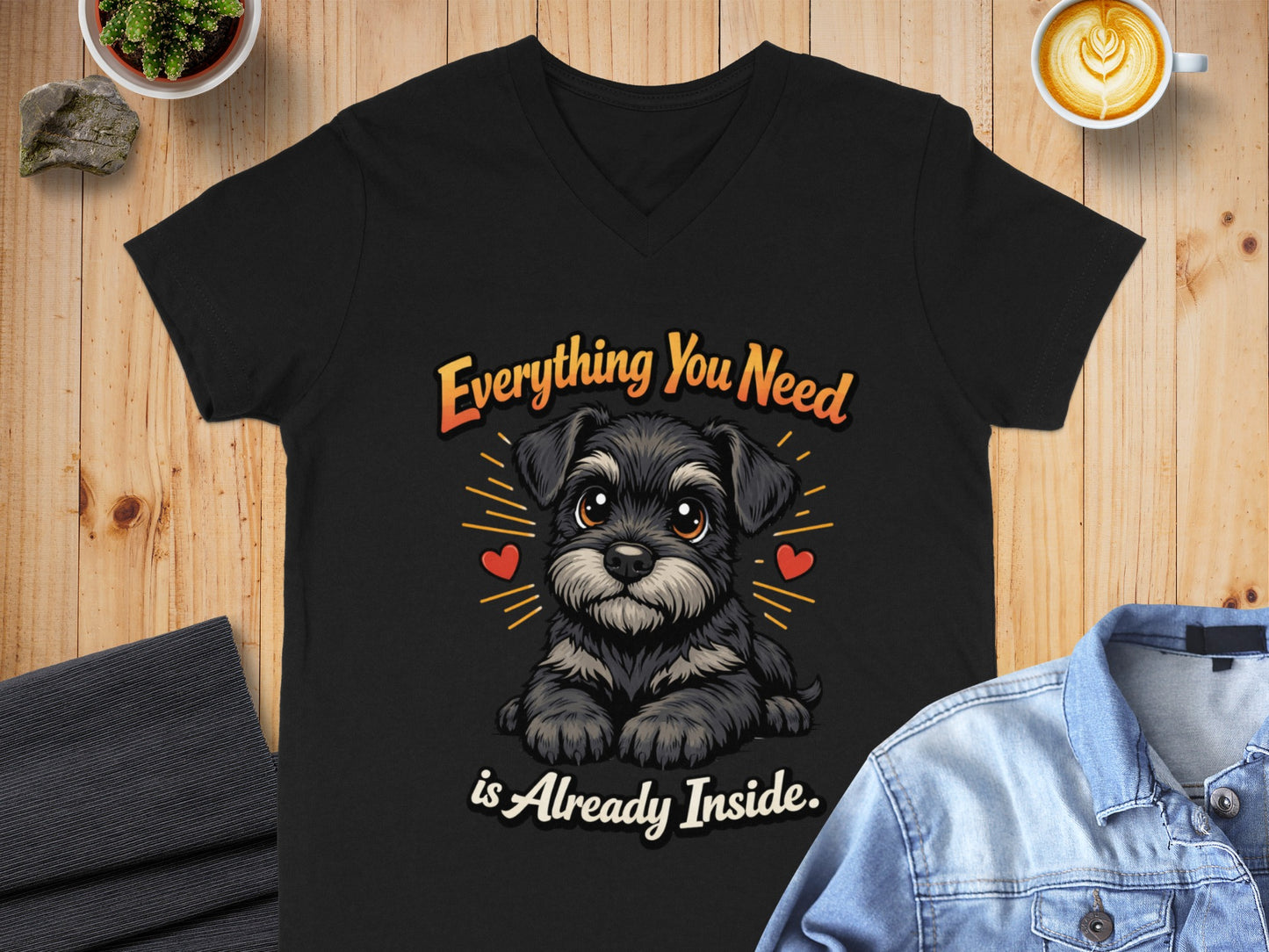 Black v-neck t-shirt with cartoon schnauzer and text "Everything You Need is Already Inside."