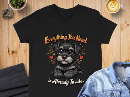 Black v-neck t-shirt with cartoon schnauzer and text "Everything You Need is Already Inside."
