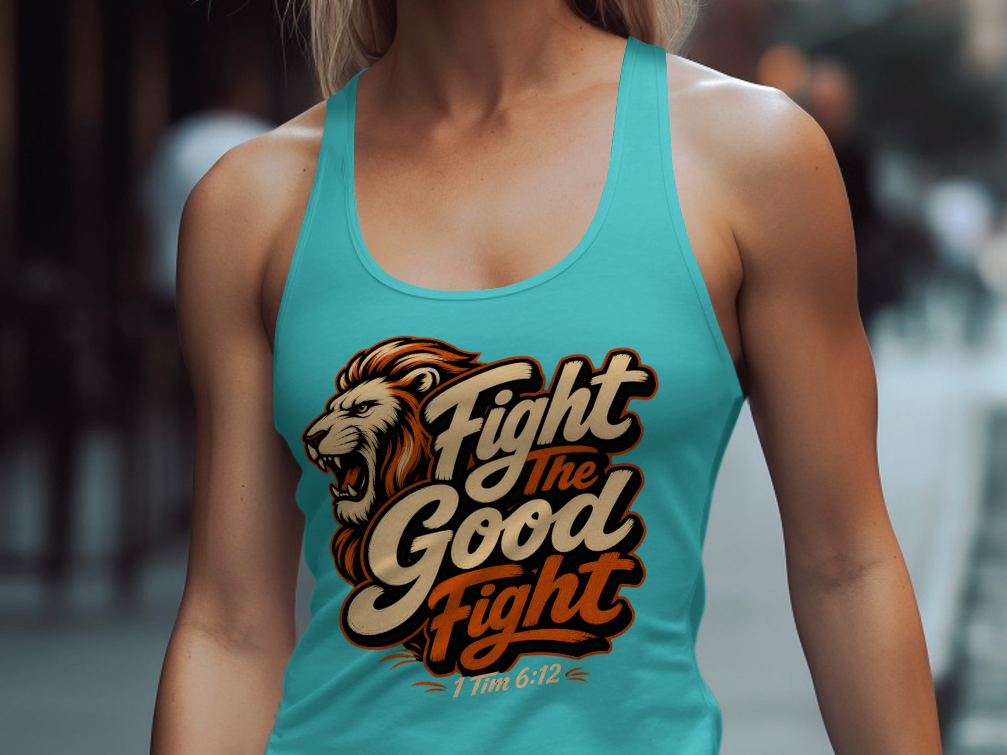 Turquoise tank top with lion graphic and text "Fight the Good Fight 1 Tim 6:12."