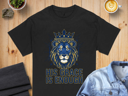 Black t-shirt with blue and gold lion wearing a crown, text "HIS GRACE IS ENOUGH".