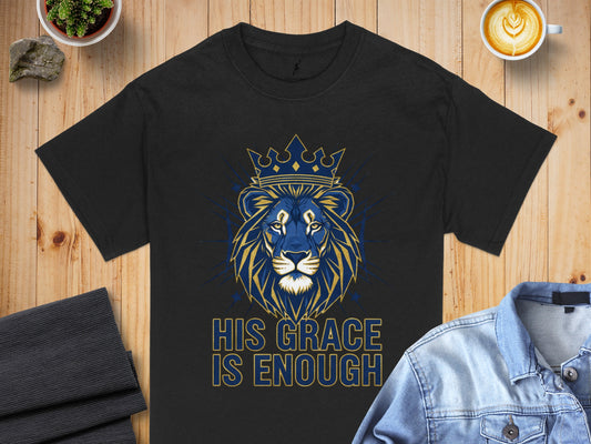 Black t-shirt with blue and gold lion wearing a crown, text "HIS GRACE IS ENOUGH".