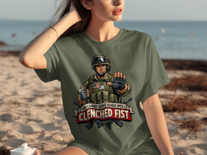 Green t-shirt with soldier graphic and text "You cannot shake hands with a clenched fist".