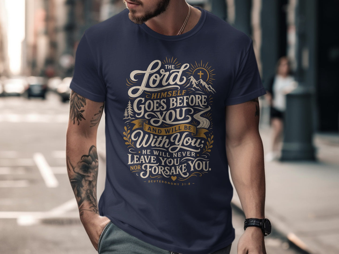 Navy t-shirt with text "The Lord Himself Goes Before You and Will Be With You. He Will Never Leave You Nor Forsake You. Deuteronomy 31:8".