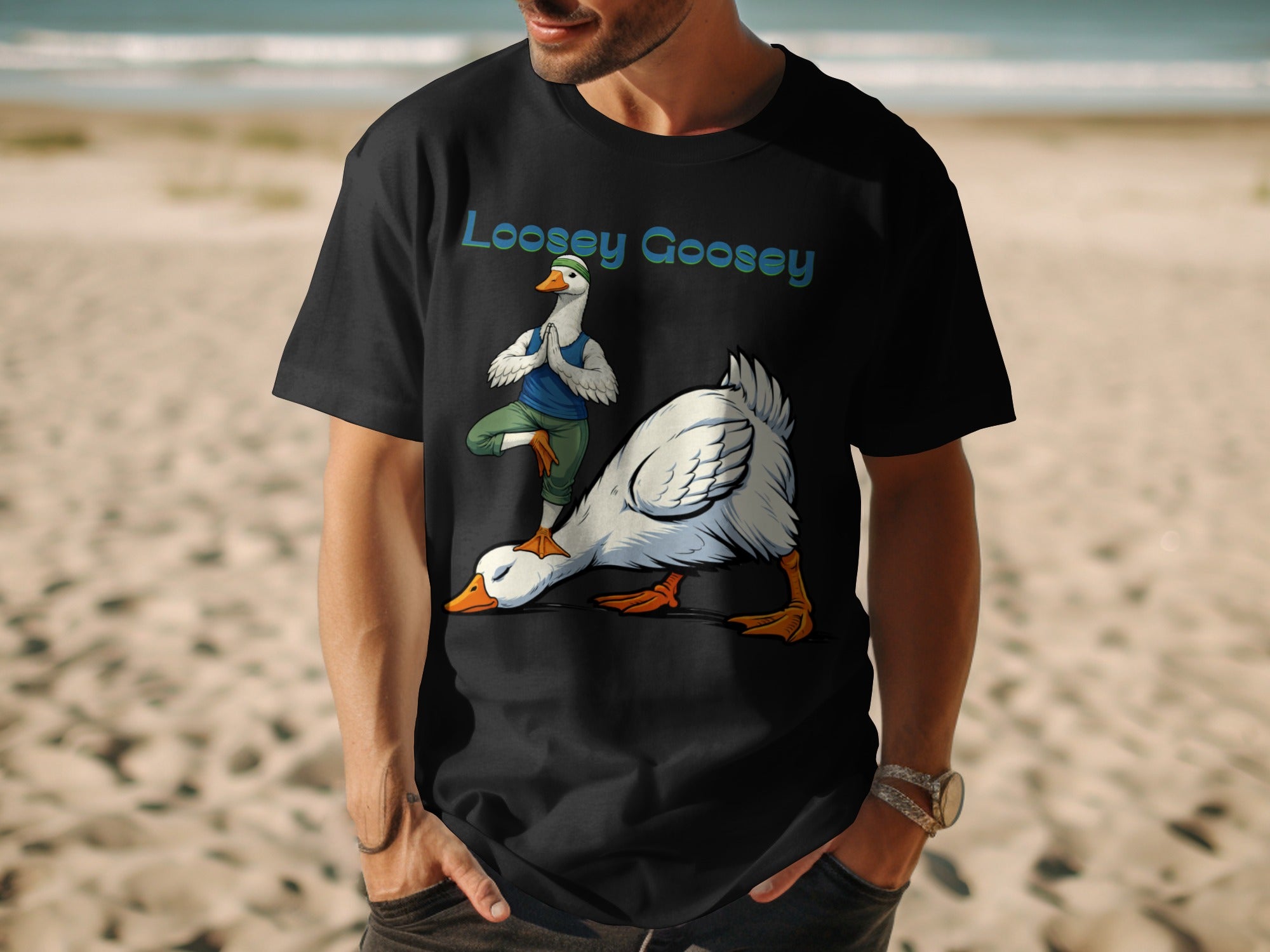 Black t-shirt with "Loosey Goosey" and cartoon goose doing yoga.