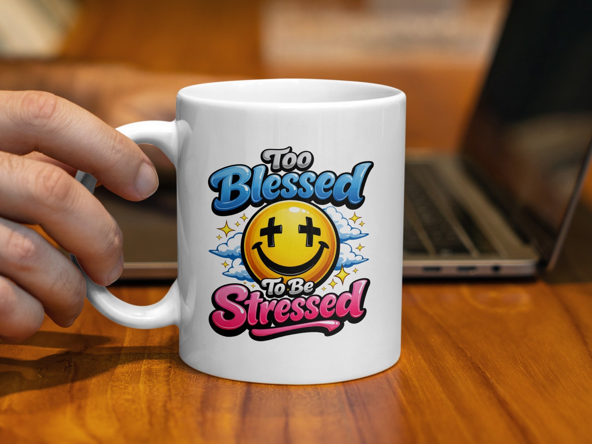 White mug with "Too Blessed To Be Stressed" text and smiley face illustration.