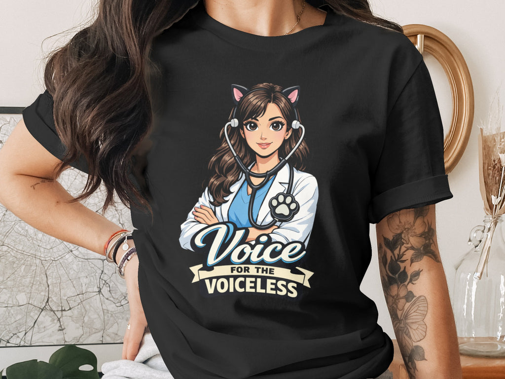 Black t-shirt with cartoon of veterinarian with cat ears, stethoscope, and text: Voice for the Voiceless.