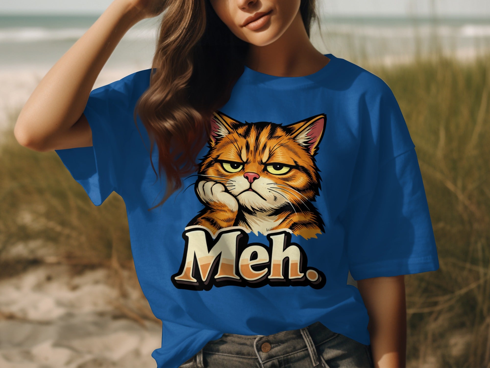 Blue t-shirt with grumpy cat graphic and "Meh." text.