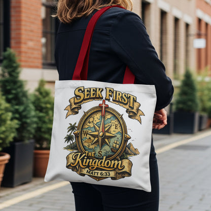 White tote bag with compass design, "Seek First" and "The Kingdom" text, Matt 6:33.