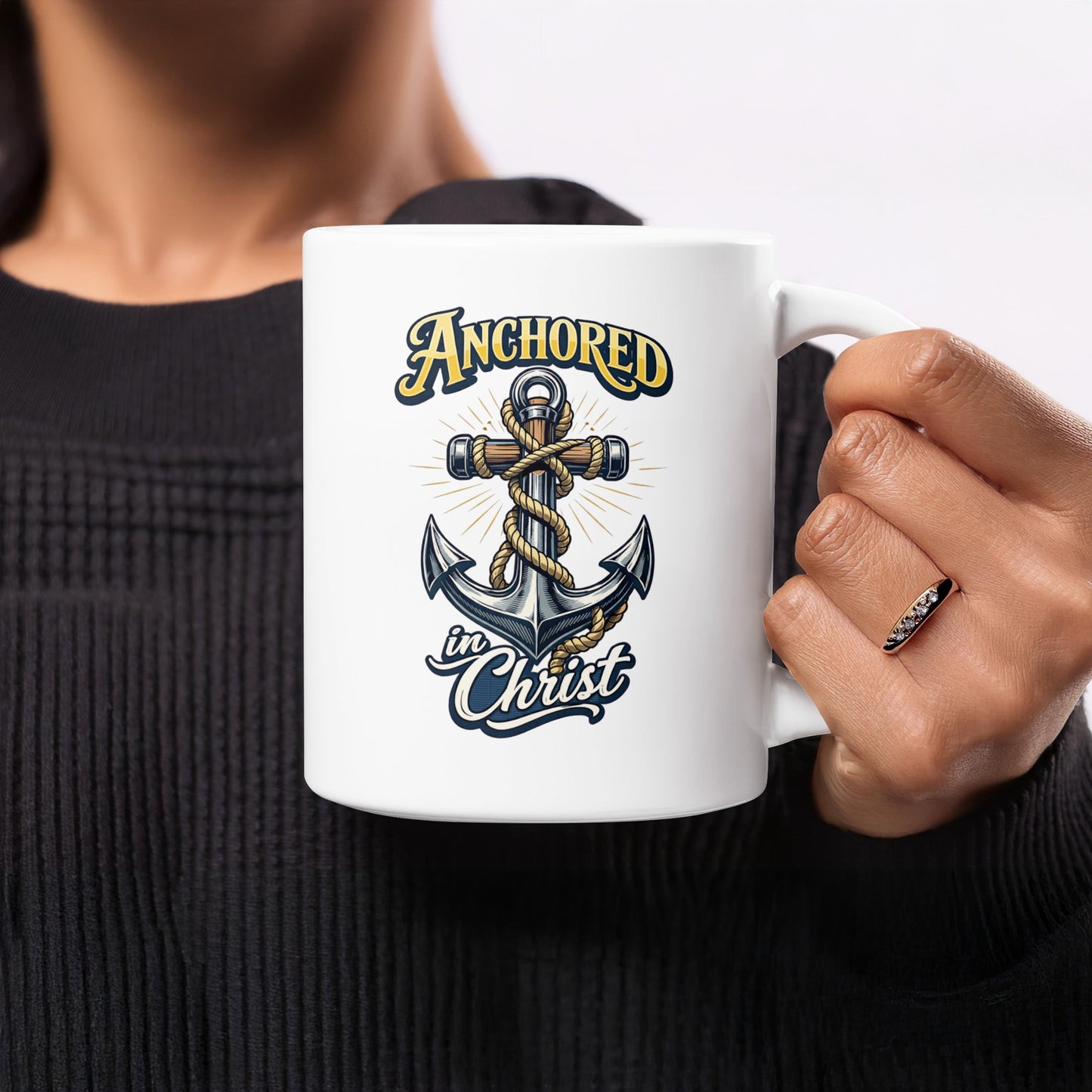 White mug with "Anchored in Christ" text and an anchor graphic.