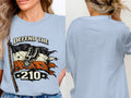 Light blue t-shirt with a distressed flag graphic that says "DEFEND THE 210".