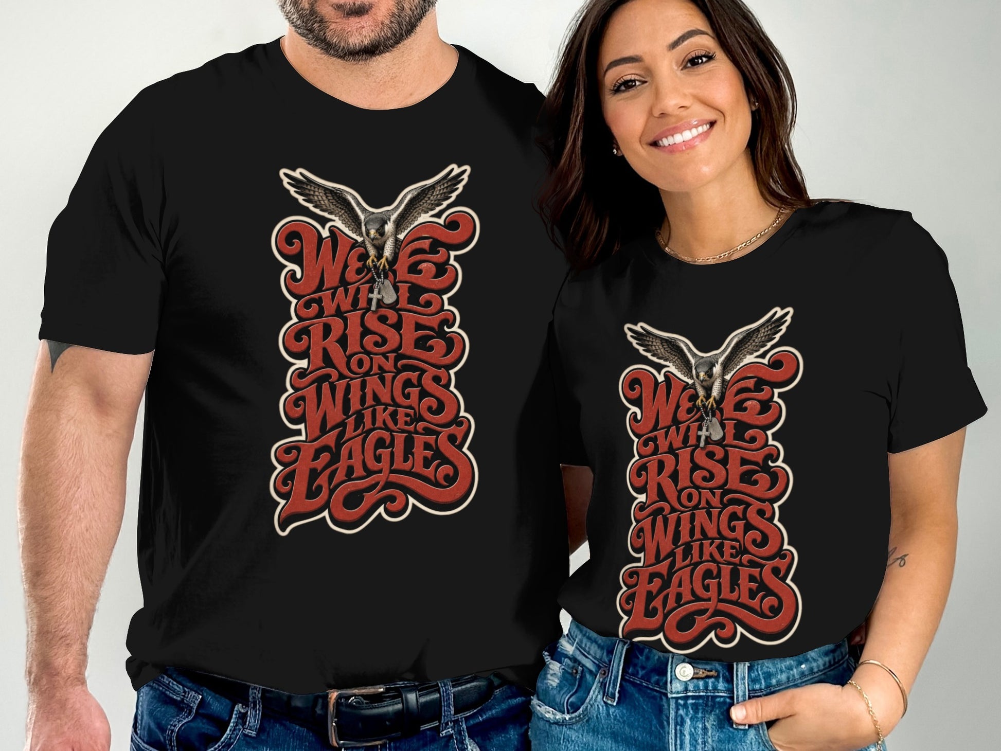 T-shirts featuring a hawk graphic and "We Will Rise On Wings Like Eagles" text.