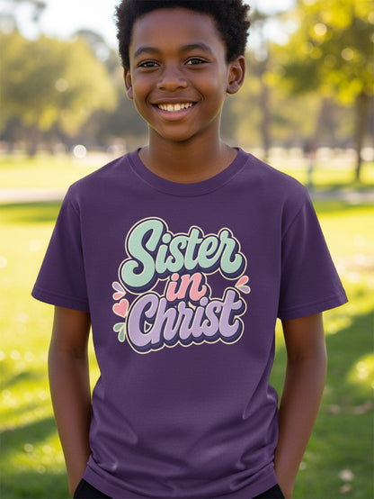 Boy wearing a purple t-shirt with "Sister in Christ" graphic.
