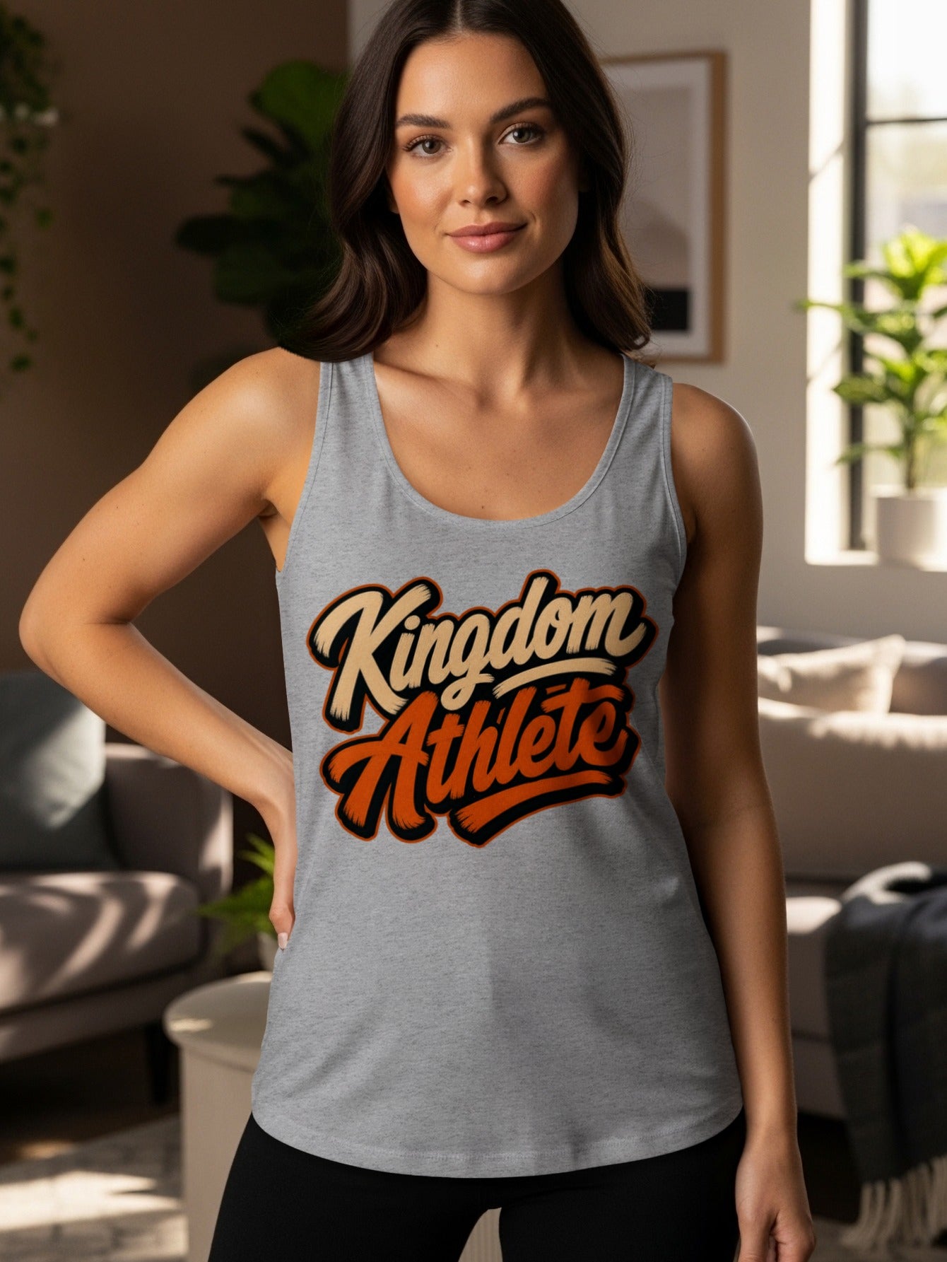 Grey tank top with "Kingdom Athlete" text in orange and cream script.
