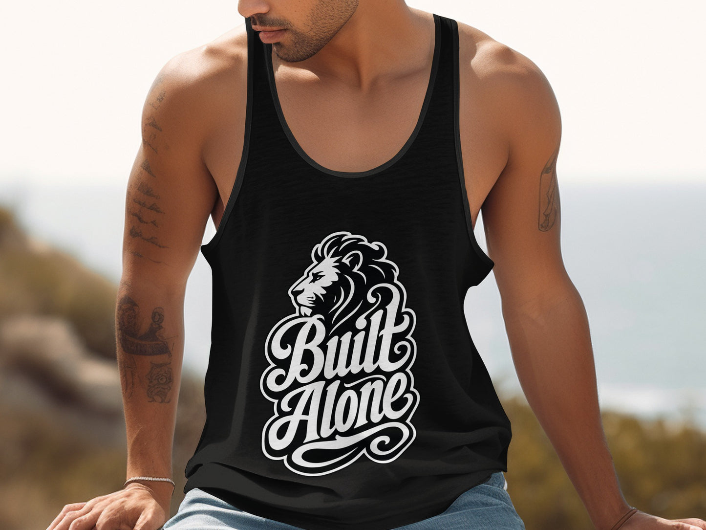 Black tank top with white lion graphic and "Built Alone" text.