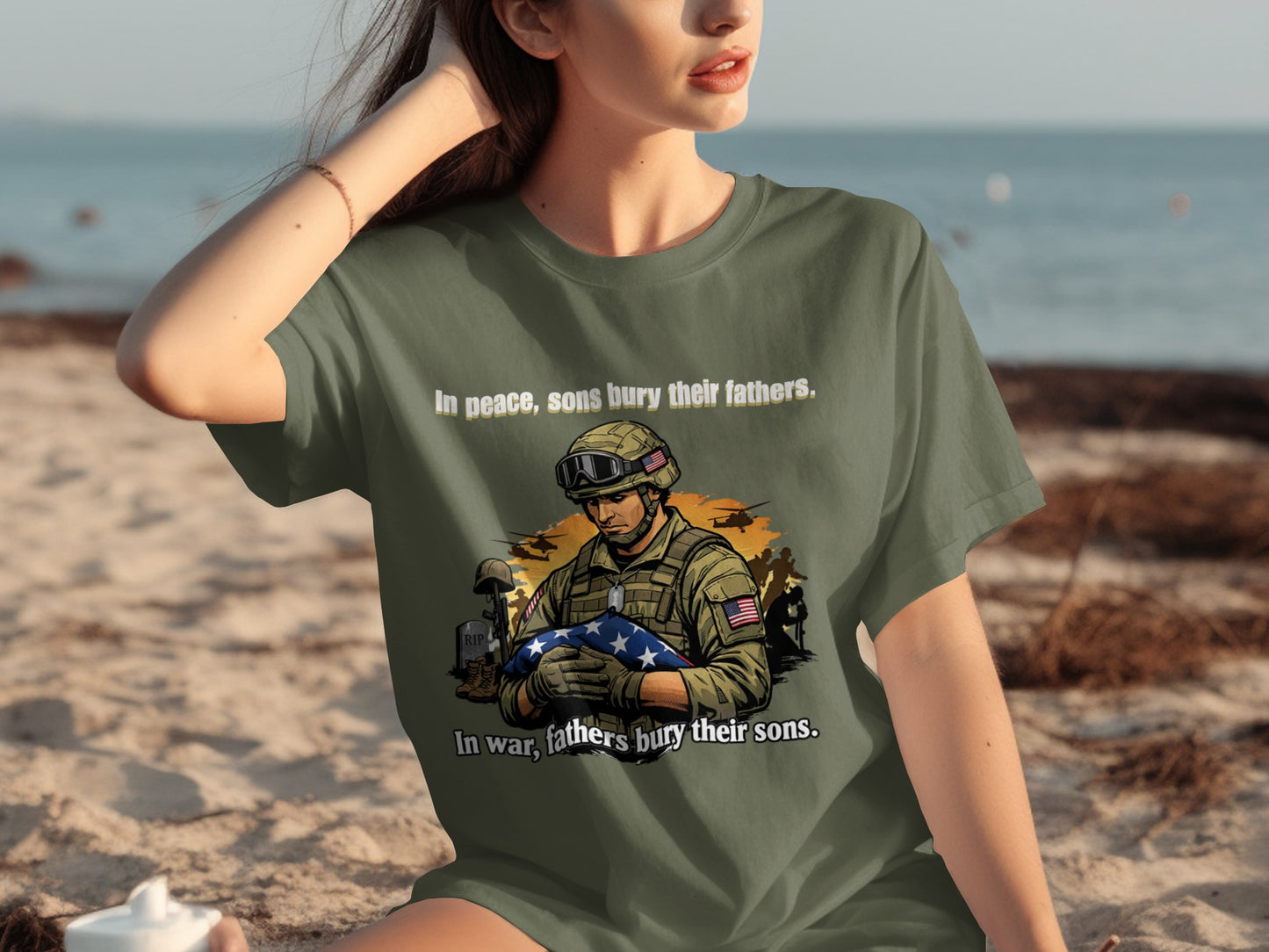 T-shirt with graphic of soldier holding flag, text: "In peace, sons bury their fathers."