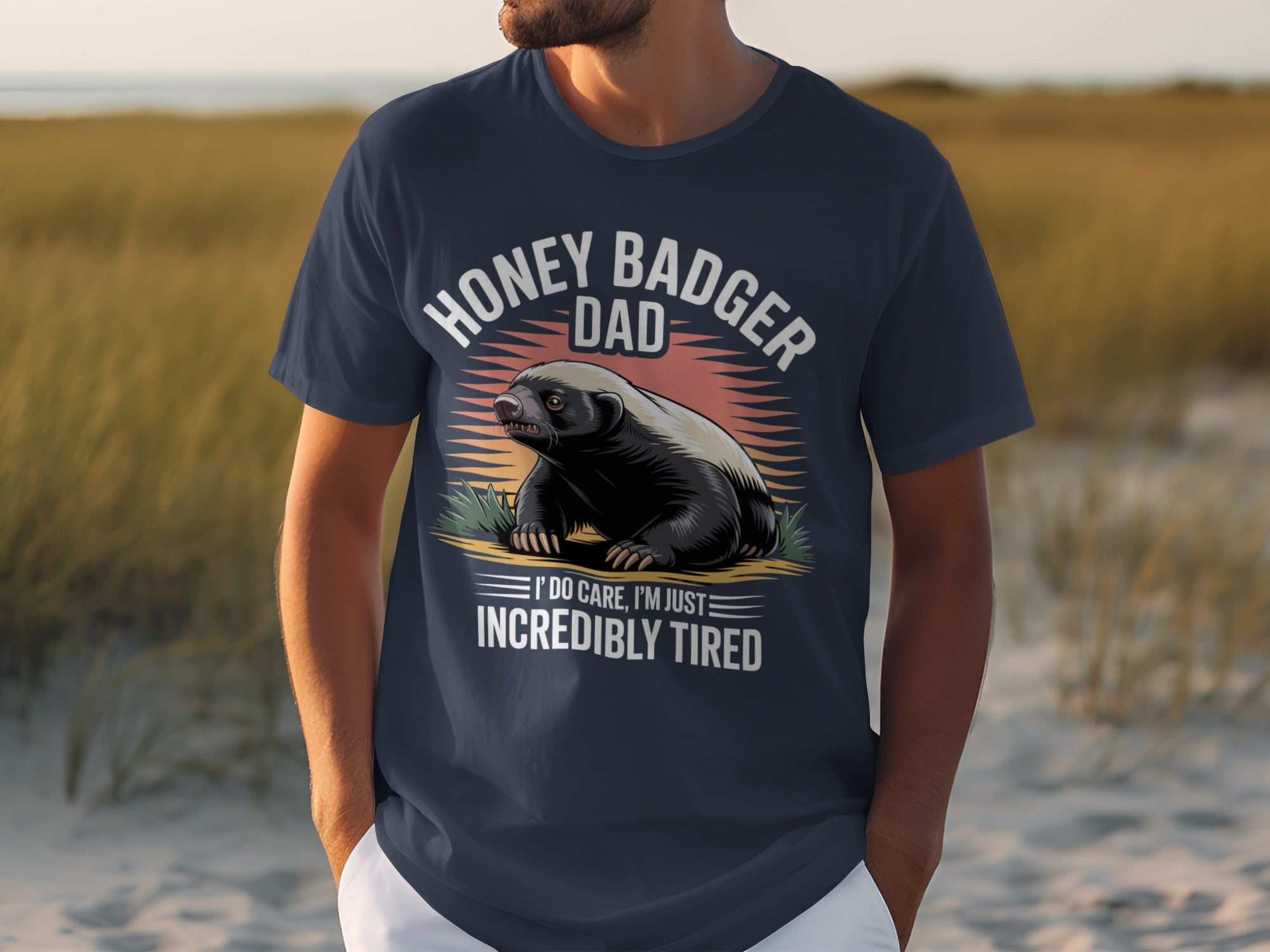 Navy t-shirt with honey badger dad graphic and text: "I Do Care, I'm Just Incredibly Tired".