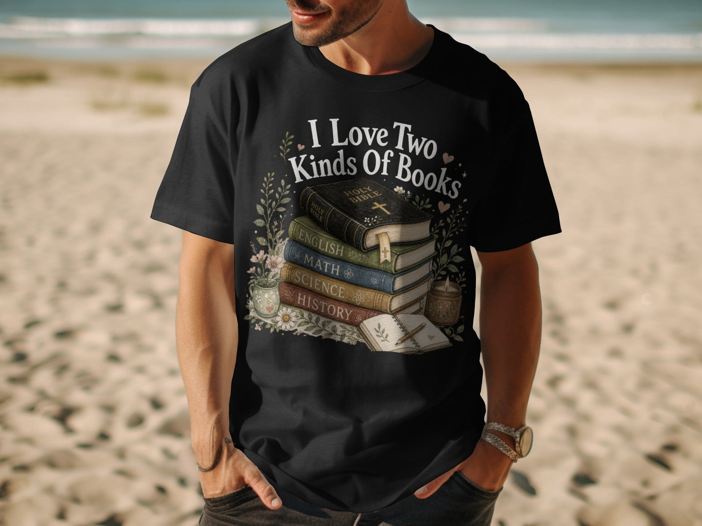 Black t-shirt with text "I Love Two Kinds Of Books" and stacked books.
