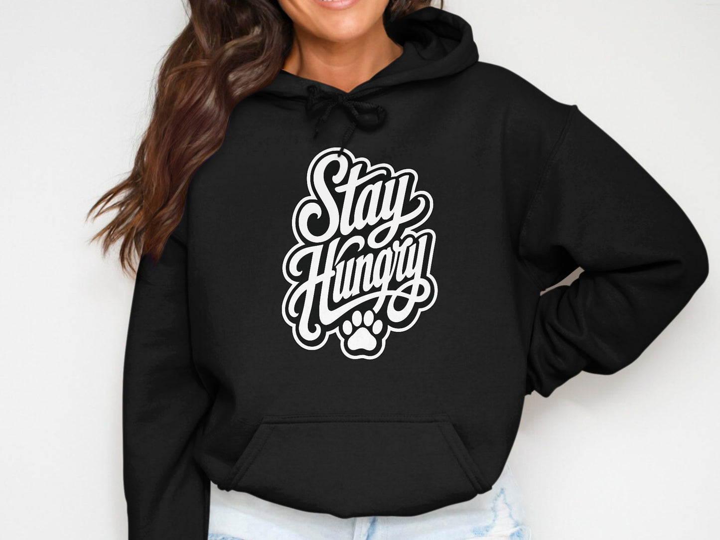 Black hoodie with white "Stay Hungry" text and a paw print graphic.