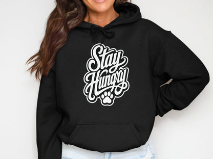 Black hoodie with white "Stay Hungry" text and a paw print graphic.