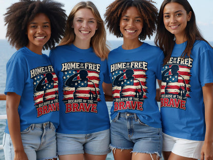 Four smiling women in blue shirts with "Home of the Free Because of the Brave" graphic.
