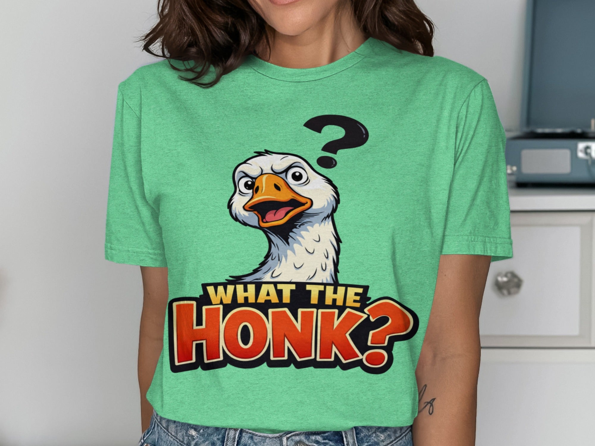 Graphic t-shirt with a confused goose and "What the Honk?" text.