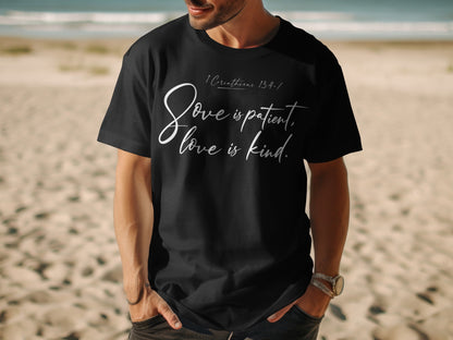Black t-shirt with white text: "1 Corinthians 13:4-7 Love is patient, love is kind."