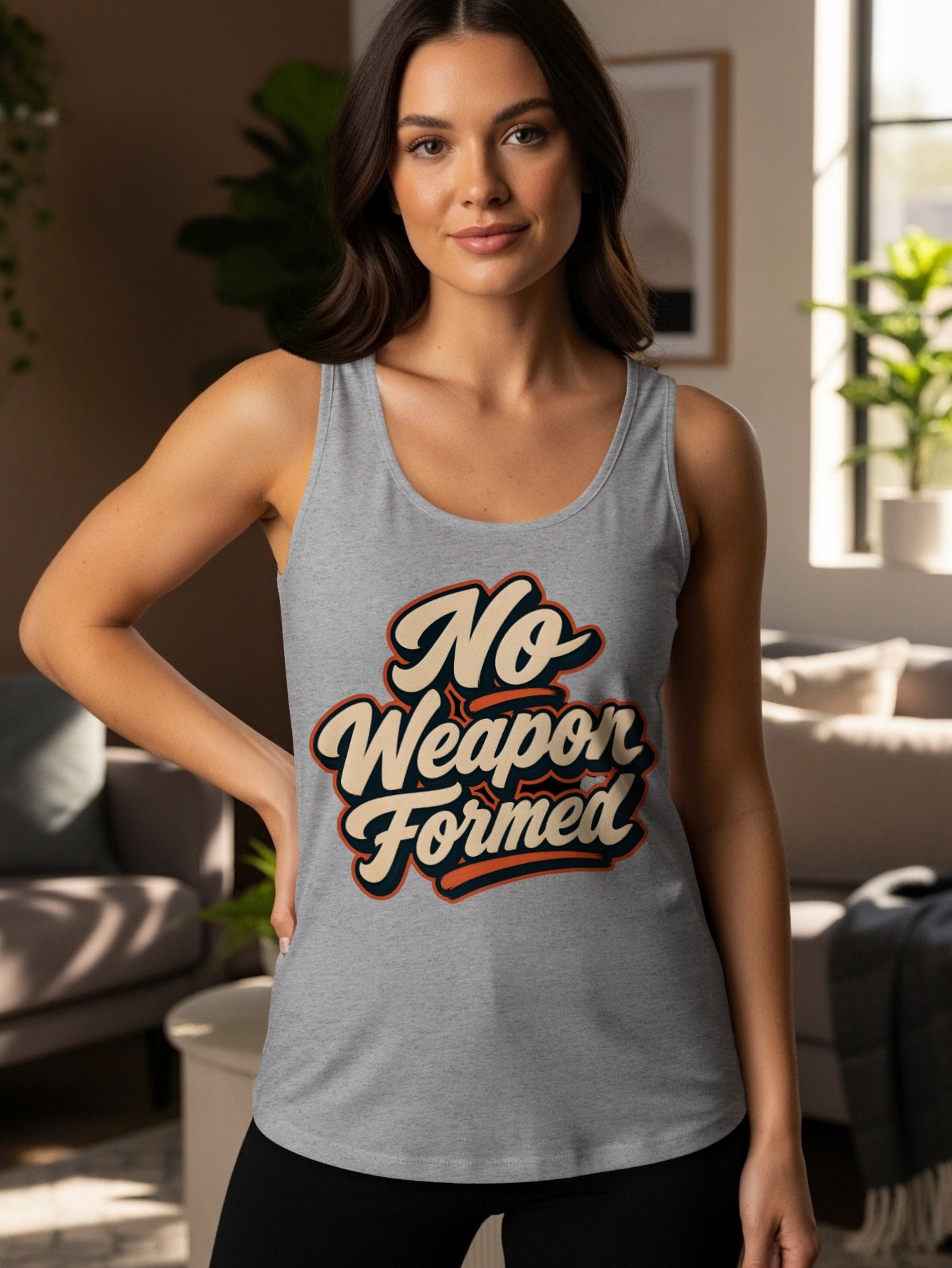 Grey tank top with "No Weapon Formed" text in retro script.