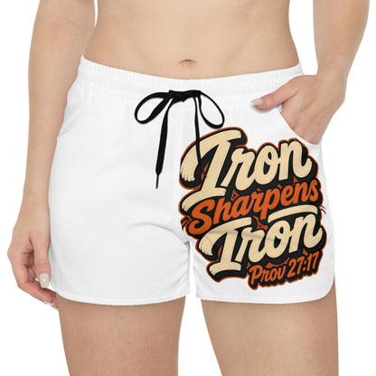 White shorts with black drawstring featuring bold text: Iron Sharpens Iron, Prov 27:11.