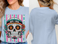 Light blue t-shirt with sugar skull graphic featuring "SPURS" and basketball eyes.