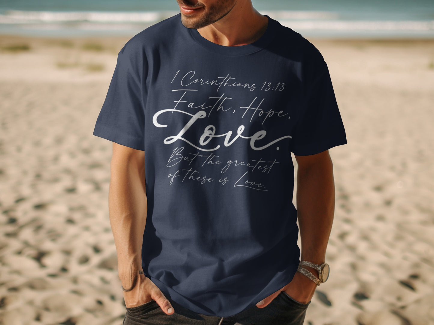 Dark blue t-shirt with 1 Corinthians 13:13 scripture printed in white script.