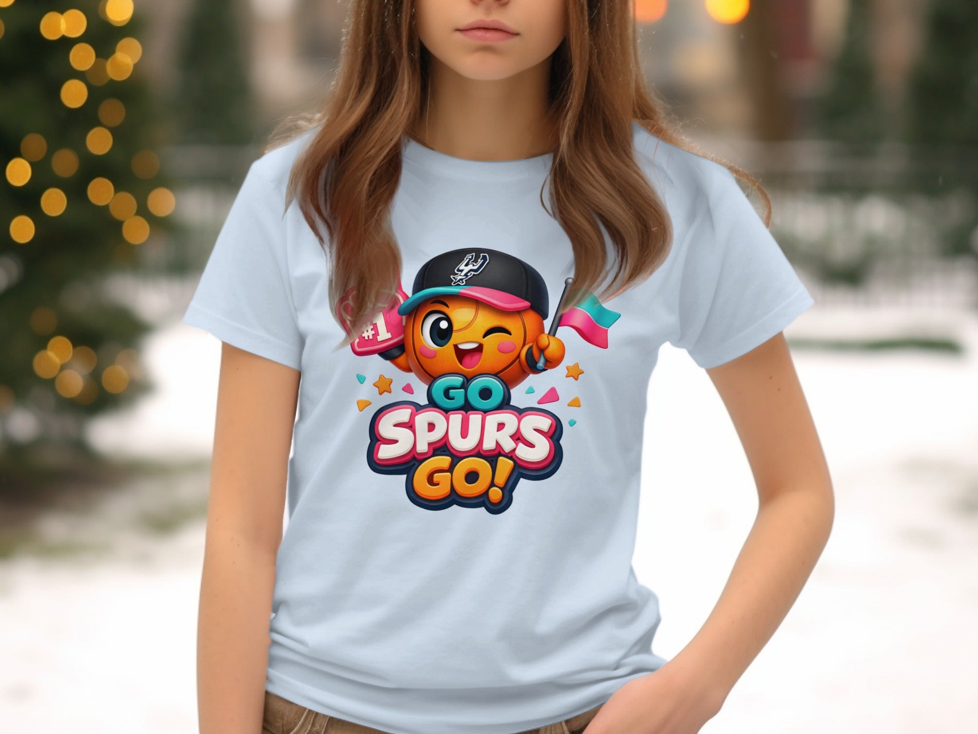 Light blue t-shirt with animated basketball character and "GO SPURS GO!" text.