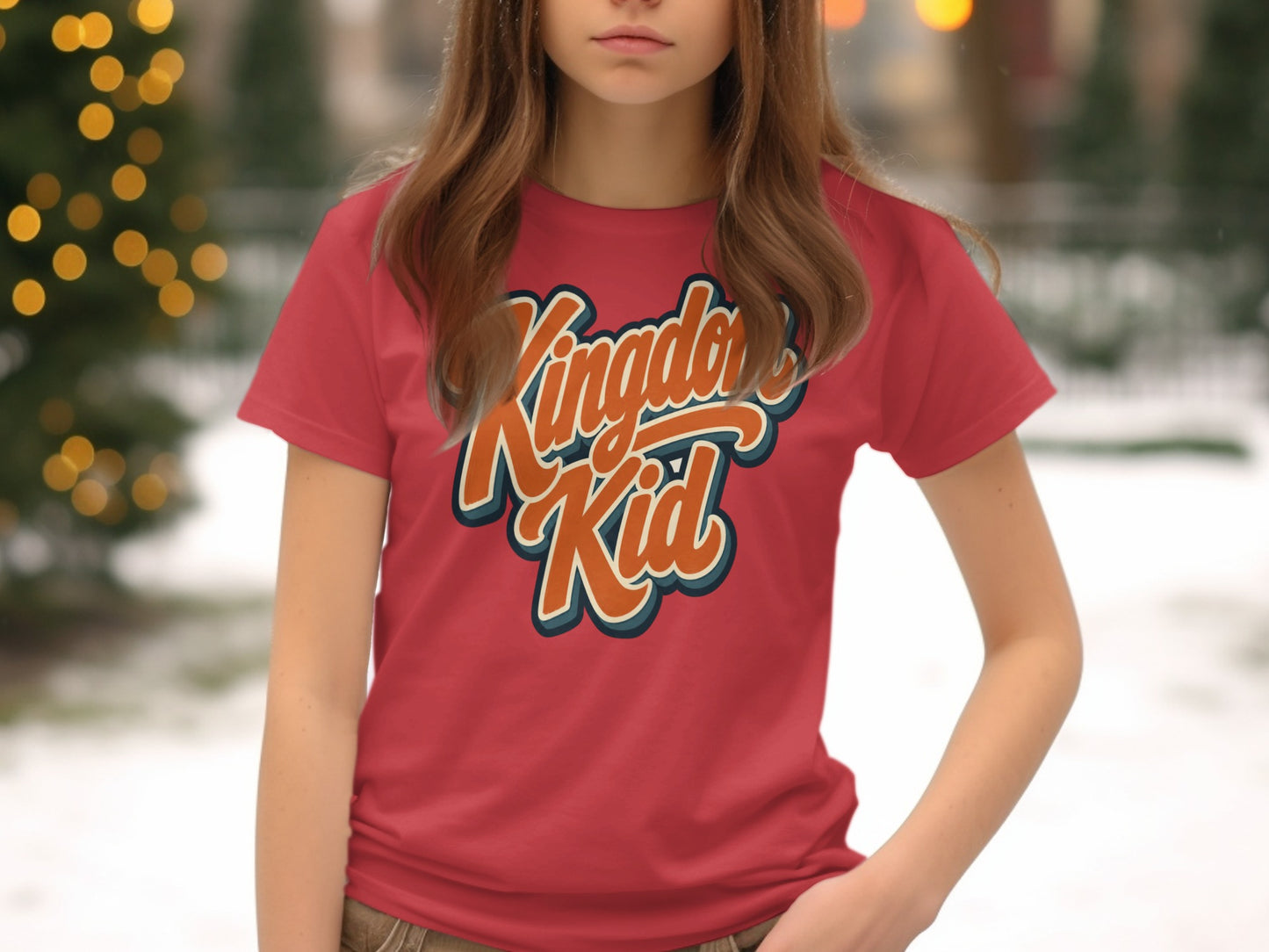 Red t-shirt with "Kingdom Kid" text in orange and blue lettering.