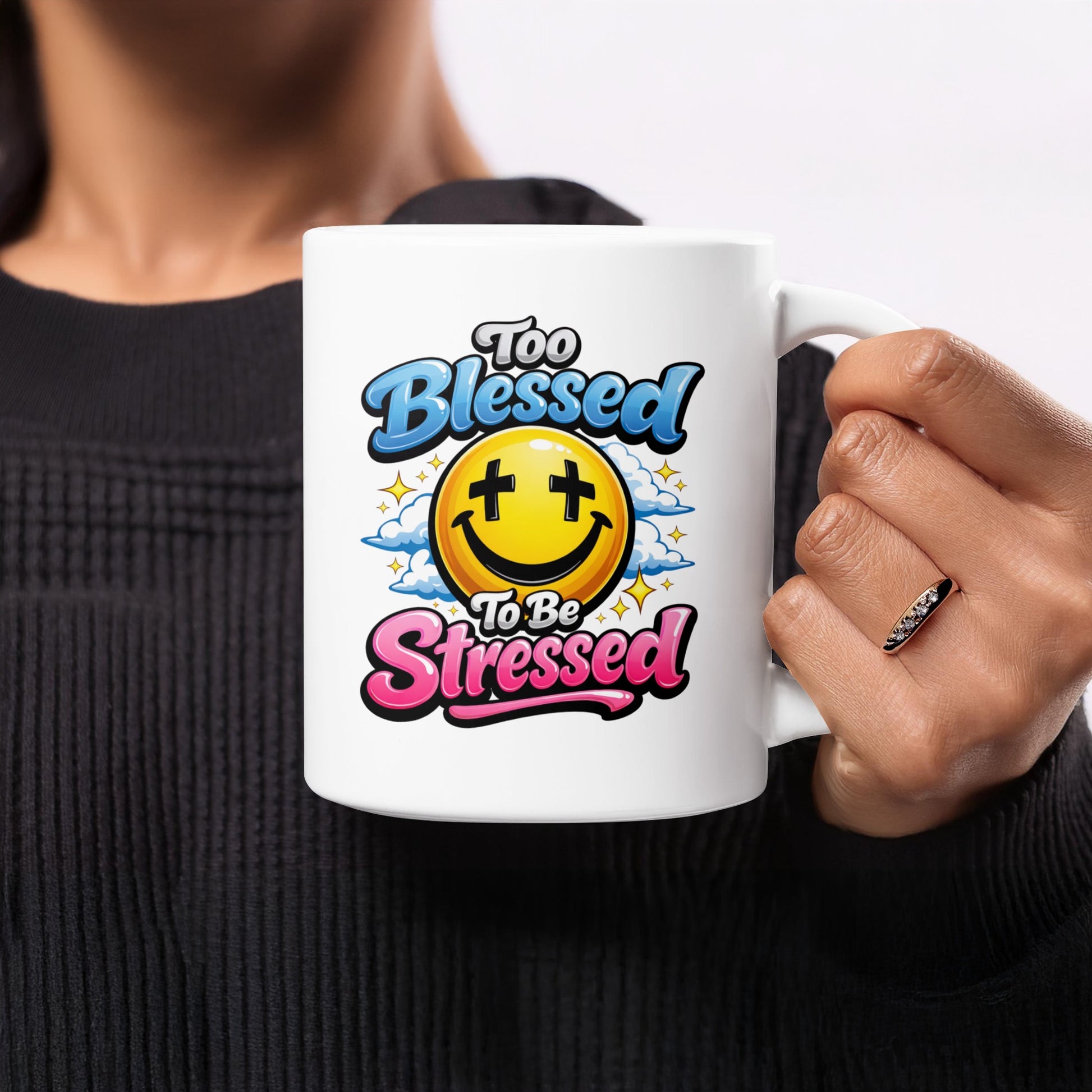White mug with "Too Blessed To Be Stressed" text and a happy smiley face design.