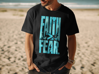 Black t-shirt with blue text "FAITH > FEAR" featuring mountains.