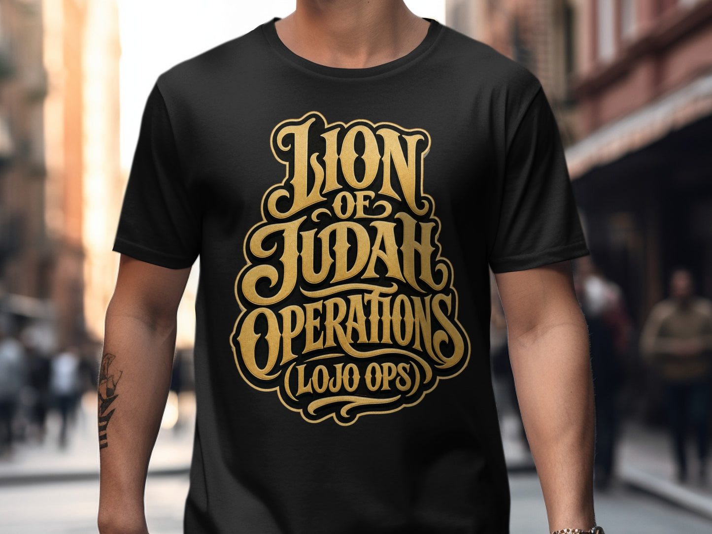 Black t-shirt with gold text "Lion of Judah Operations (LOJO OPS)".