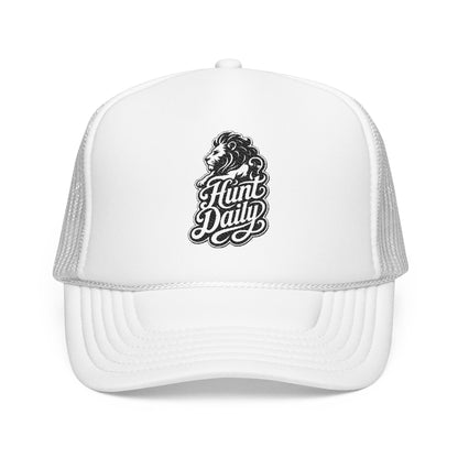 White trucker hat with "Hunt Daily" and lion logo on the front.