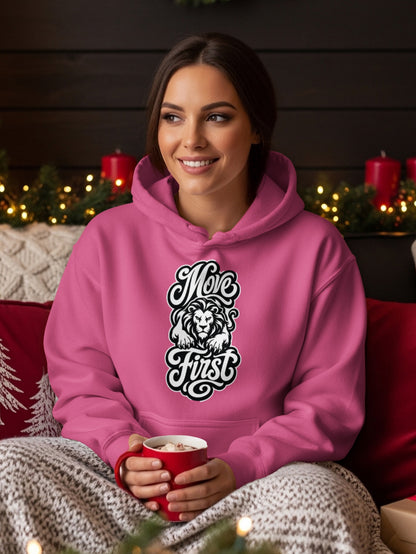 Pink hoodie with "Move First" text and a proud lion graphic on the chest.