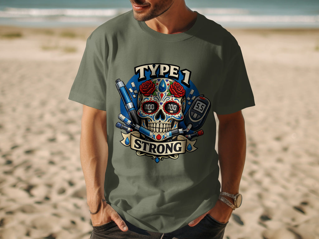 Type 1 Strong skull graphic with diabetes supplies on a grey t-shirt.