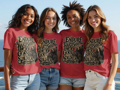 Four women in red shirts with text and a bear design, posing for a photo.