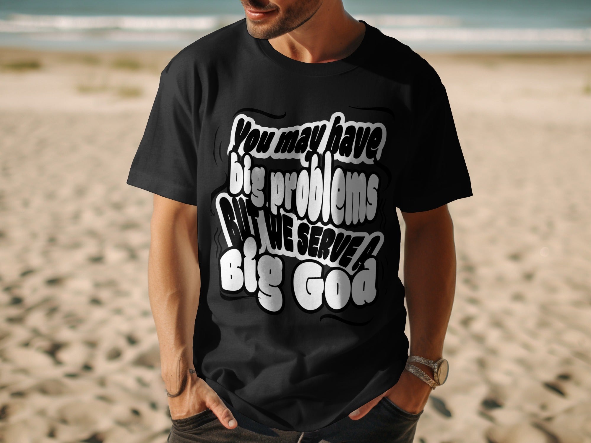 Black t-shirt with white text reading "You may have big problems but we serve a Big God".