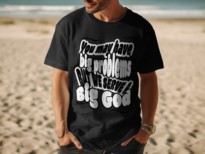 Black t-shirt with white text reading "You may have big problems but we serve a Big God".