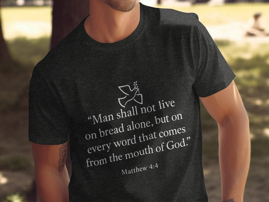 Dark t-shirt with dove graphic and Matthew 4:4 scripture.